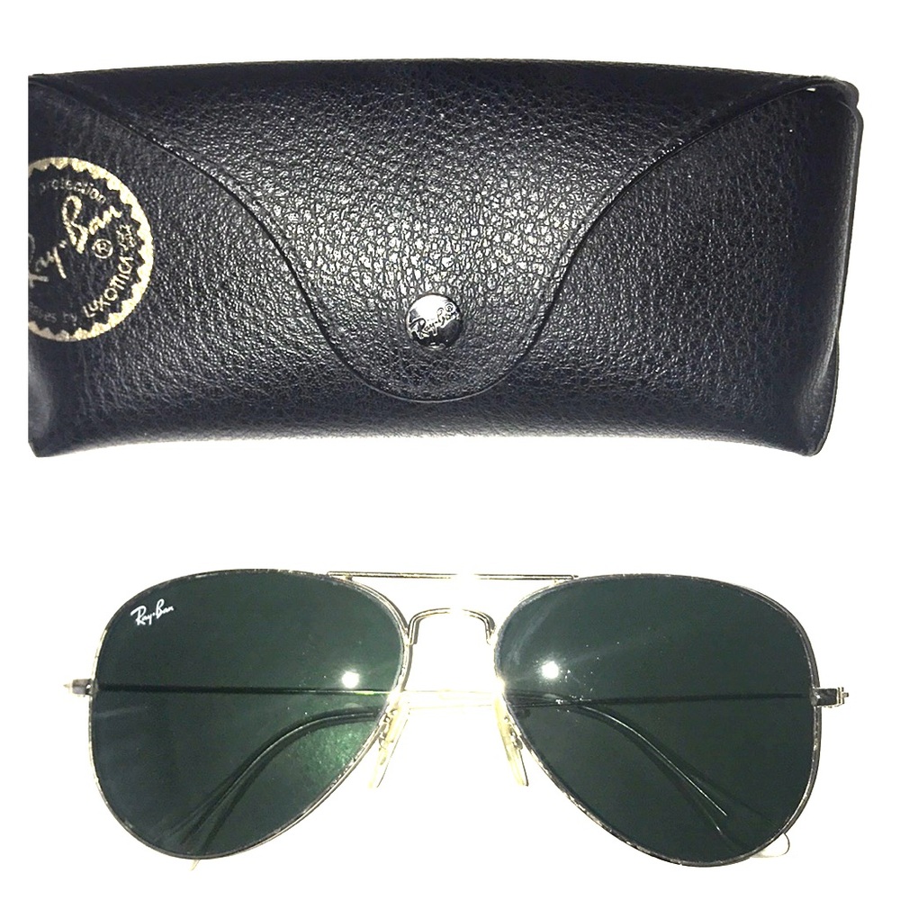 Ray- Bans: Classic Gold Aviators with grey lenses.